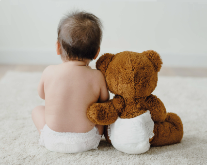 baby with a teddy bear